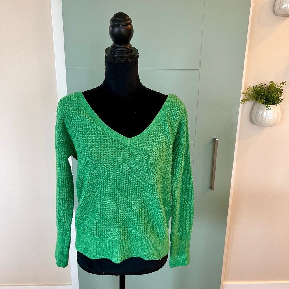 Women's v-neck with open criss cross back.